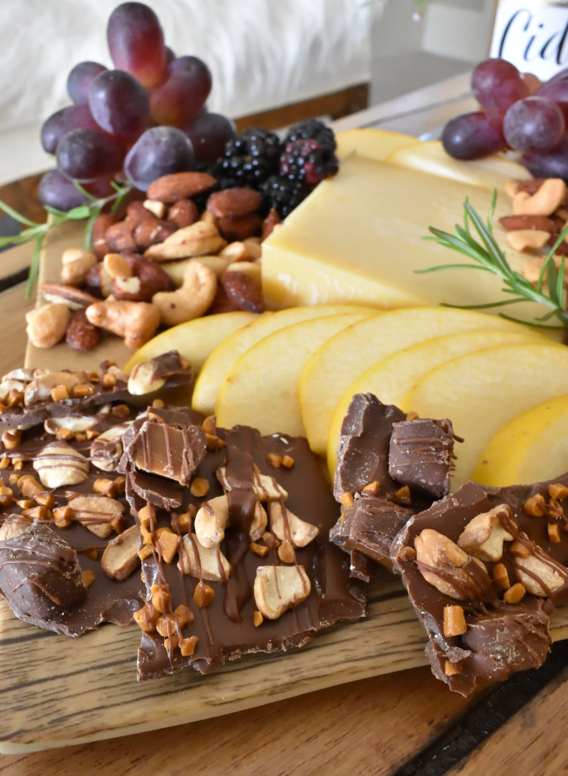 apples and chocolate on an appetizer tray