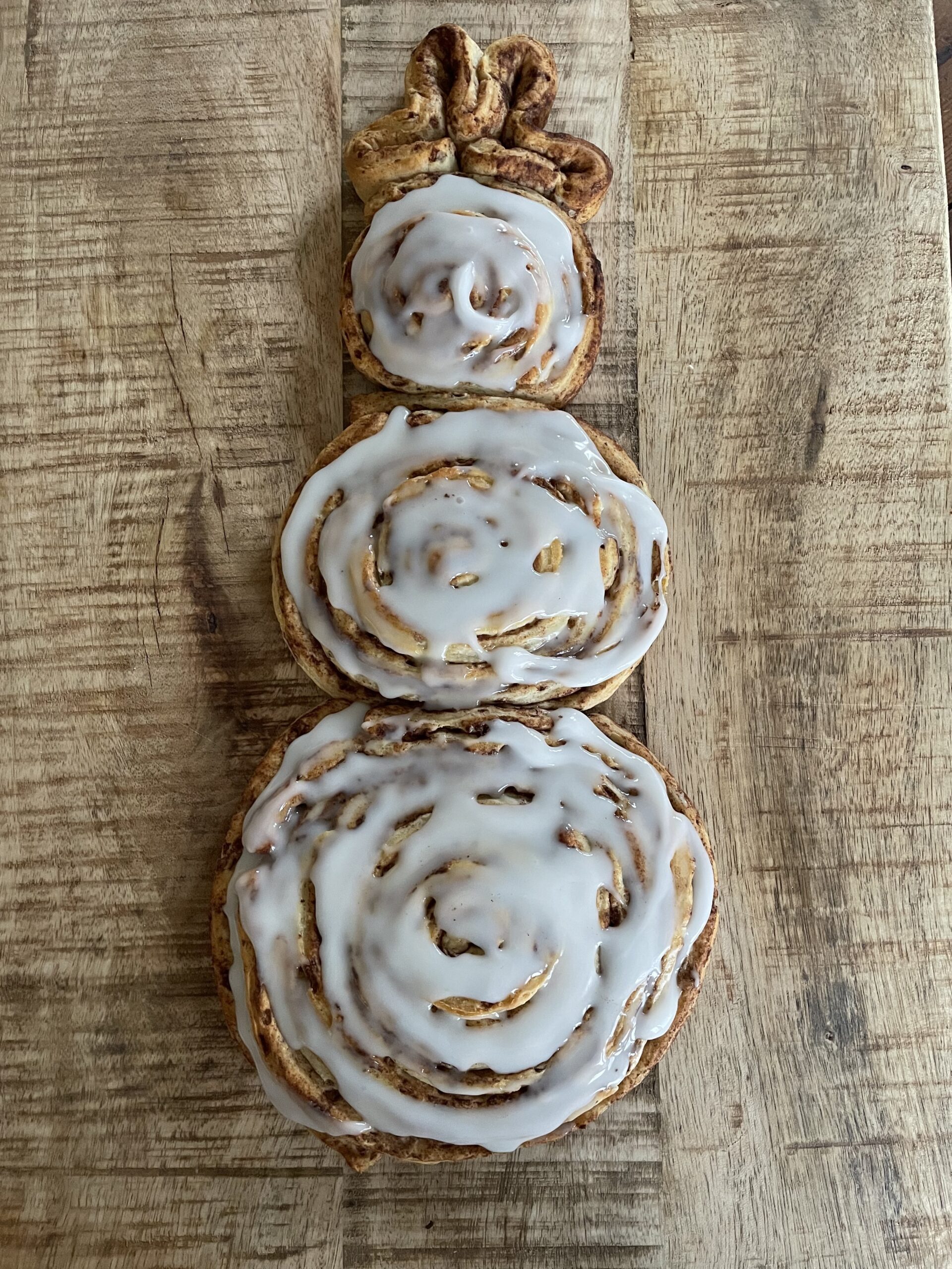 creating a cinnamon roll snowman